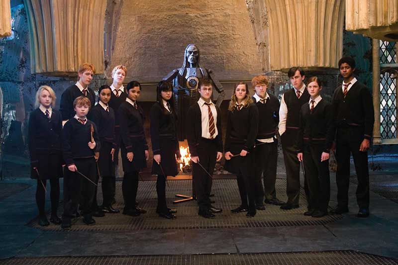 Harry Potter and Dumbledore's army stand together.
