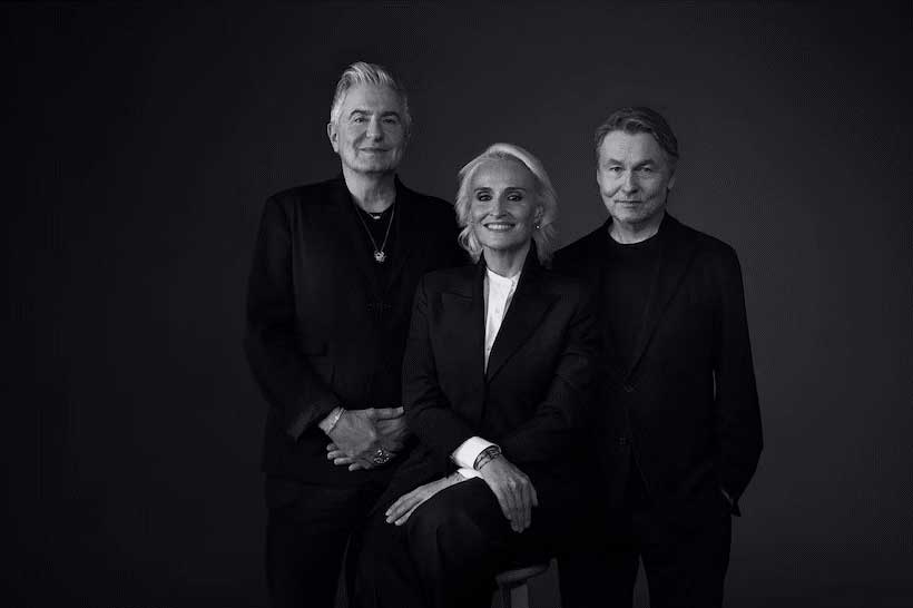 Black and white image of San Francisco Symphony Music Director Esa-Pekka Salonen, pianist Jean-Yves Thibaudet, and Cartier in-house perfumer Mathilde Laurent