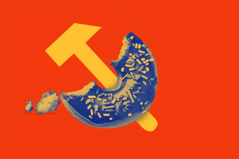 The soviet hammer sign on an orange background.