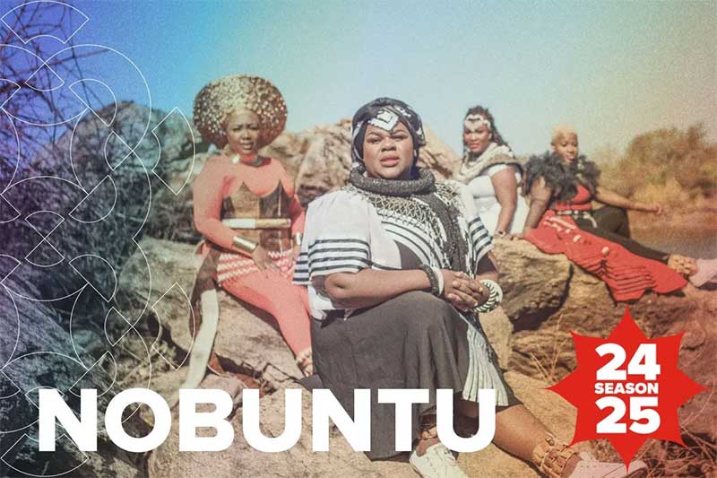 The female a cappella group Nobuntu sit outside in a desert looking landscape.