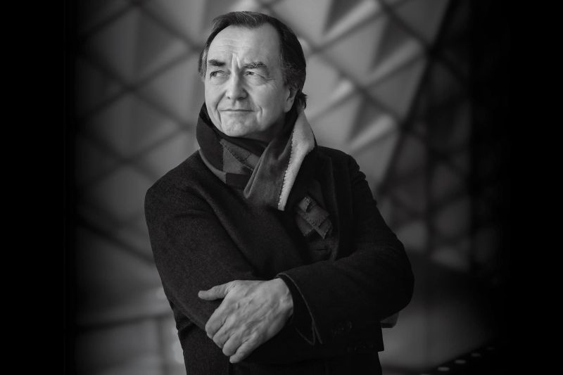 A black and white photo of Pierre Laurent Aimard.