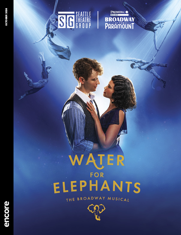 A man and woman embrace while acrobats work in the background. | Cover of Water for Elephants, STG's Broadway at the Paramount, October 2026